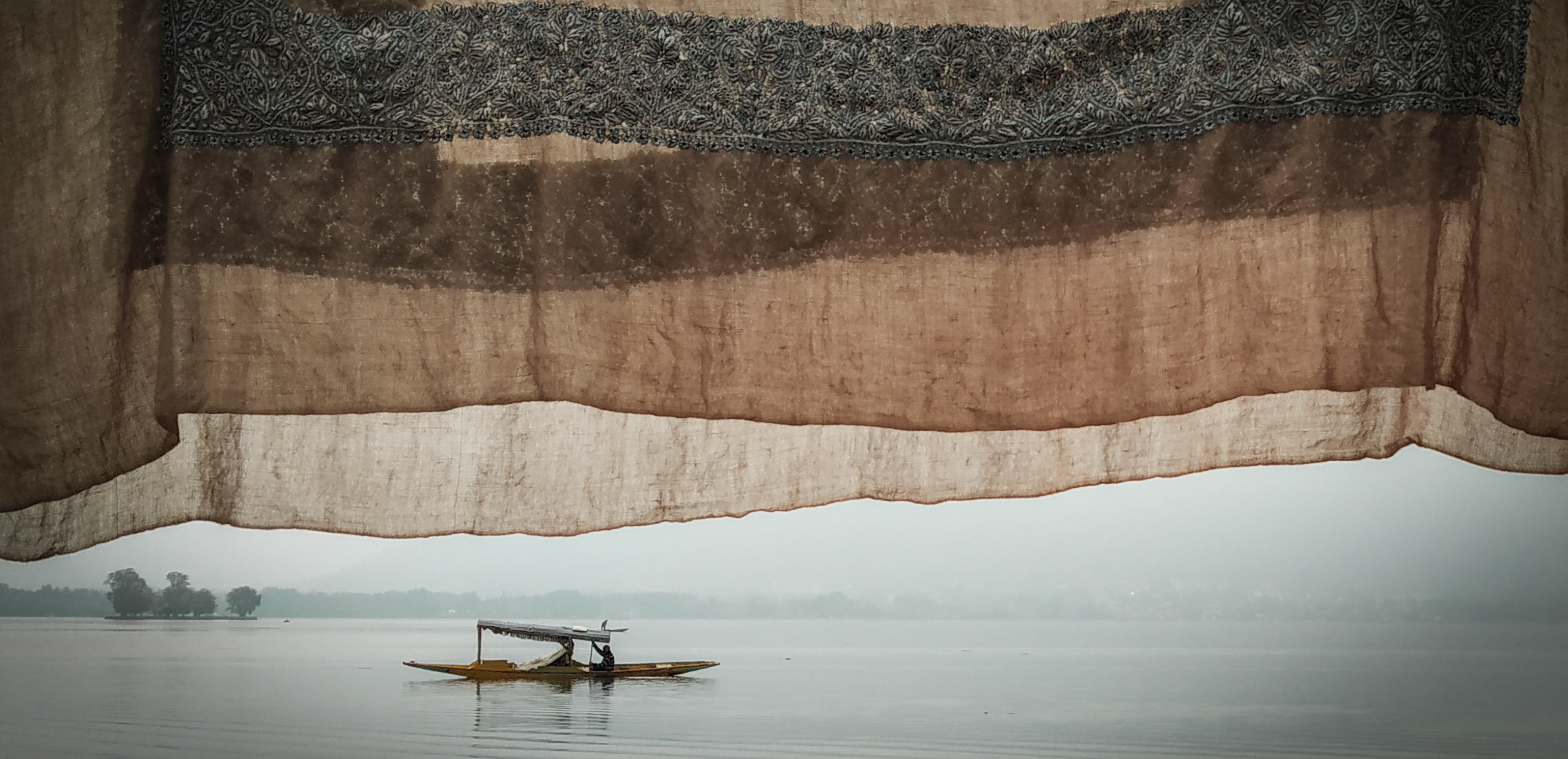 Houseboats on Dal Lake against snow-capped mountains, Srinagar